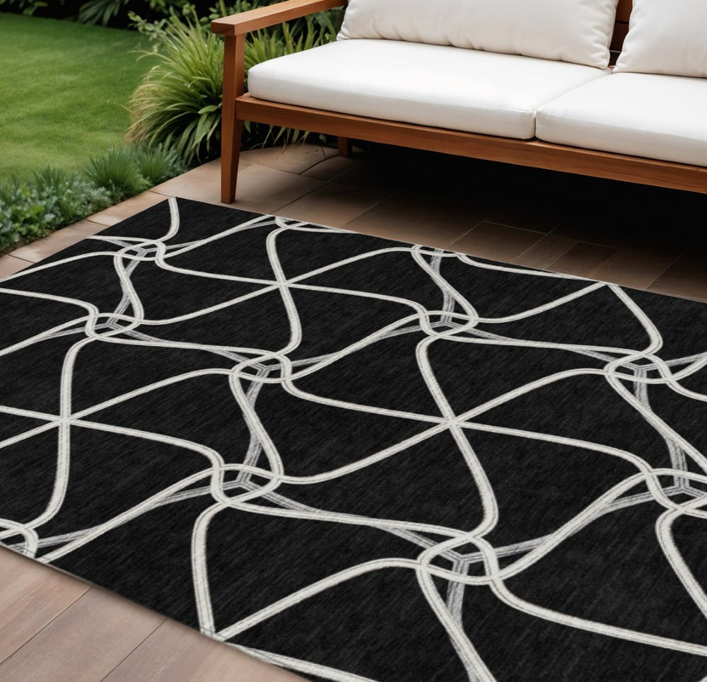 HomeRoots 5' Black and Ivory Geometric Area Rug - Durable, Washable, Indoor/Outdoor, Perfect for High Traffic Areas 9' X 12' 612855