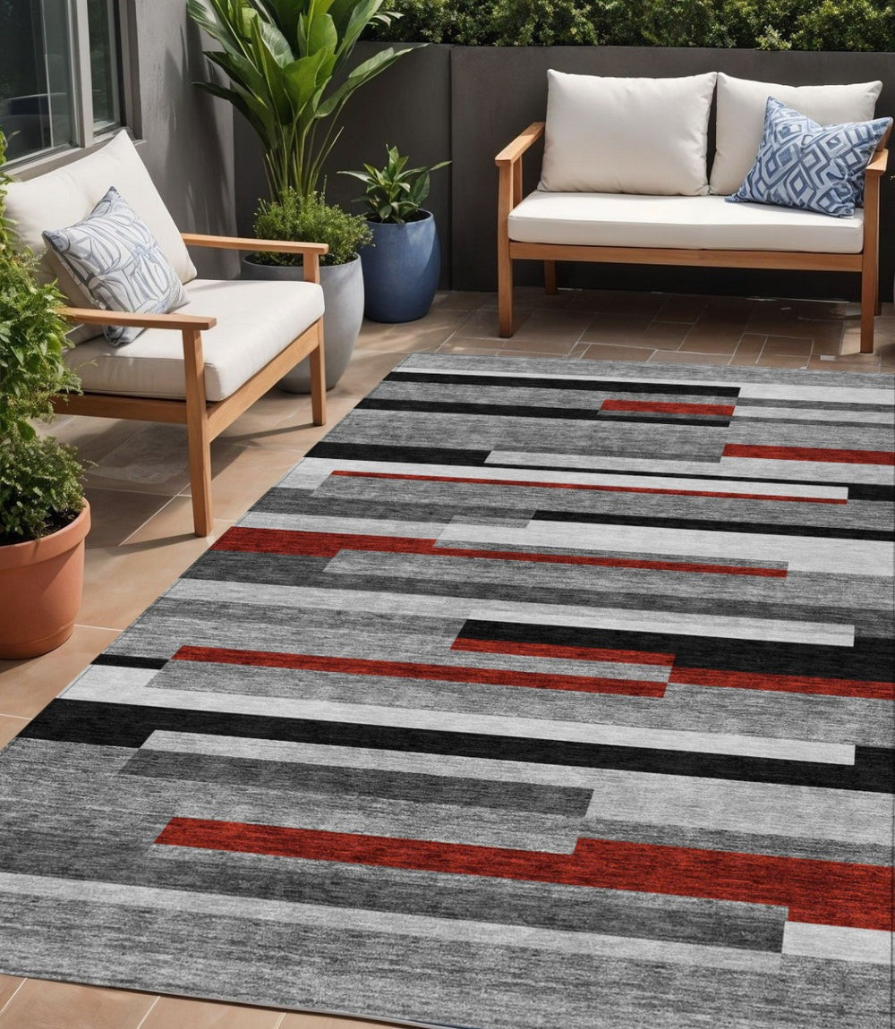 HomeRoots 5' Durable Washable Gray Black and Red Striped Area Rug for Indoor Outdoor Spaces - Modern Style! 5' X 8' 613273