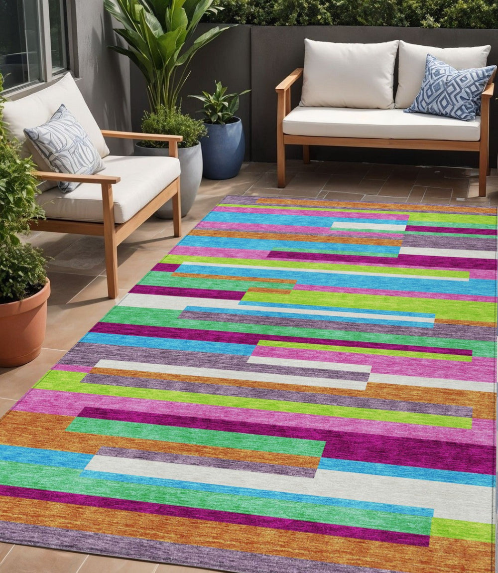 HomeRoots 5' Vibrant Striped Area Rug in Lavender, Orange, and Lime Green – Washable Indoor/Outdoor Design 5' X 8' 613291