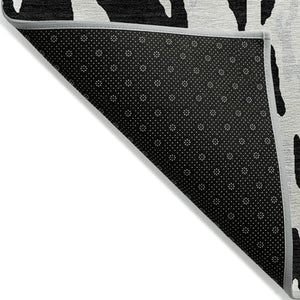 HomeRoots 5' Black and Ivory Abstract Area Rug - Modern, Durable, Washable Design for Indoor and Outdoor Use 8' X 10' 613329