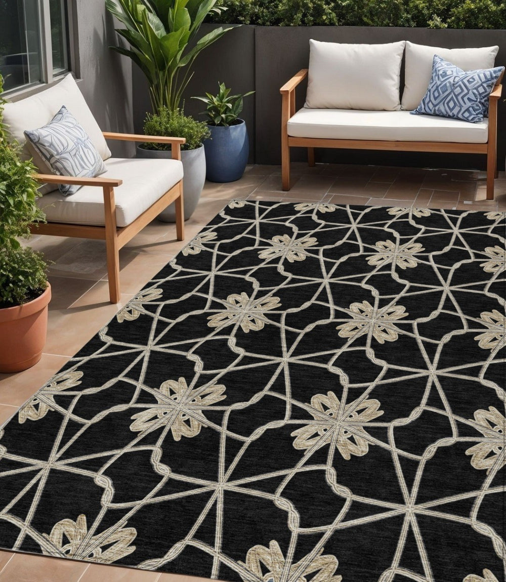 HomeRoots 5' Black and Ivory Geometric Area Rug - Durable, Washable, Indoor/Outdoor Use for Modern Spaces 5' X 8' 613405