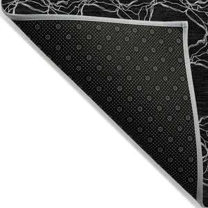 HomeRoots 5' Durable Black and White Geometric Indoor Outdoor Area Rug for High-Traffic Spaces and Style 5' X 8' 613543