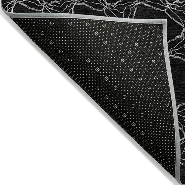 HomeRoots 5' Durable Black and White Geometric Indoor Outdoor Area Rug for High-Traffic Spaces and Style 5' X 8' 613543