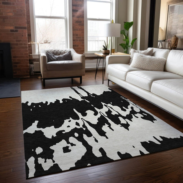 HomeRoots 5' Versatile Black and Ivory Abstract Indoor Outdoor Rug - Washable, Durable, Stylish for Any Space 9' X 12' 613618