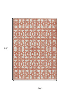 HomeRoots 5' Salmon and Ivory Geometric Area Rug - Stylish, Durable, Machine Washable for Indoor & Outdoor Use 5' X 8' 613802