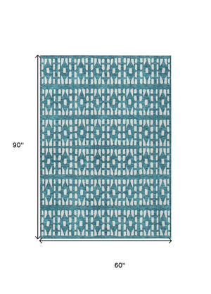 HomeRoots 5' Stylish Teal Blue and Ivory Geometric Washable Area Rug for Indoor or Outdoor Spaces 5' X 8' 613808