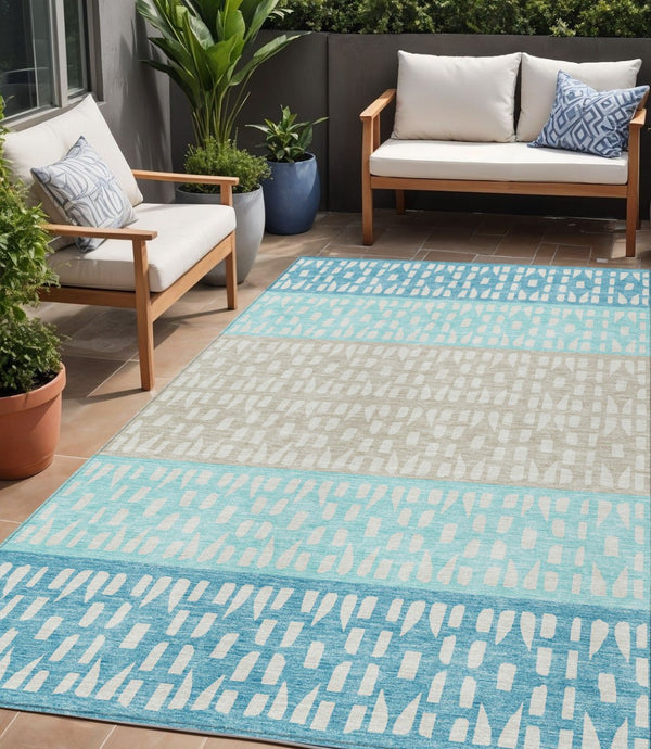 HomeRoots 5' Vibrant Teal Blue and Aqua Geometric Indoor Outdoor Area Rug - Stylish, Washable, Durable Design 5' X 8' 613874