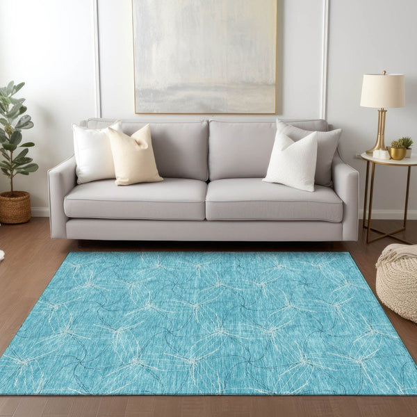 HomeRoots 5' Aqua and Ivory Geometric Area Rug - Durable, Washable Indoor/Outdoor Design for High-Traffic Spaces 5' X 8' 614048