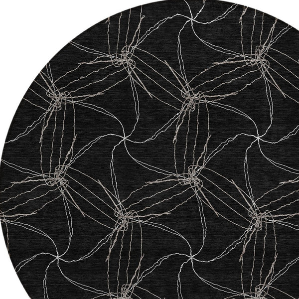 HomeRoots 5' Black and Ivory Geometric Area Rug - Stylish, Washable, Durable for Indoor and Outdoor Use 8' Round 614061