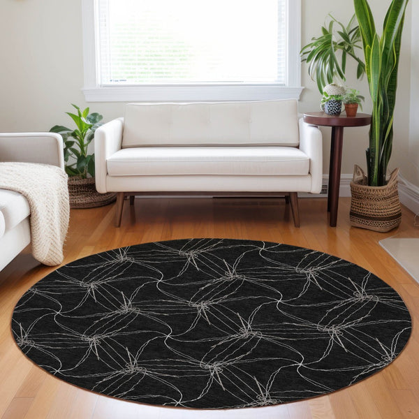 HomeRoots 5' Black and Ivory Geometric Area Rug - Stylish, Washable, Durable for Indoor and Outdoor Use 8' Round 614061