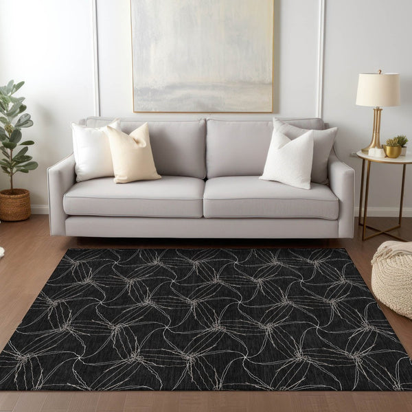 HomeRoots 5' Black and Ivory Geometric Area Rug - Stylish, Washable, Durable for Indoor and Outdoor Use 9' X 12' 614063