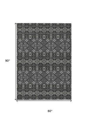 HomeRoots 5' Black and Ivory Tribal Area Rug - Stylish, Washable Design for Indoor and Outdoor Spaces 5' X 8' 614204