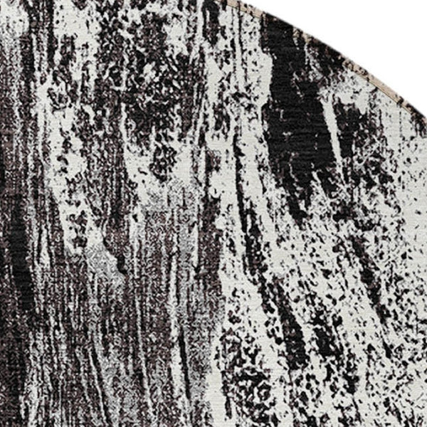 HomeRoots 5' Modern Black and Ivory Abstract Area Rug - Washable, Durable, Indoor-Outdoor Design for Any Space 8' Round 614277
