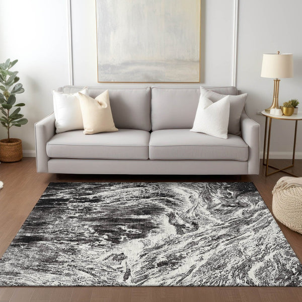 HomeRoots 5' Modern Black and Ivory Abstract Area Rug - Washable, Durable, Indoor-Outdoor Design for Any Space 10' X 14' 614280