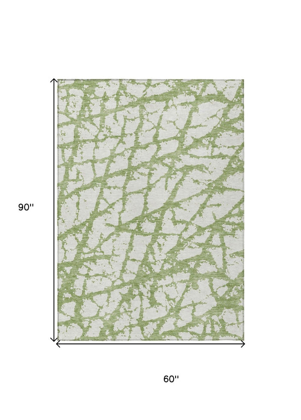 HomeRoots 5' Modern Green and Ivory Abstract Washable Area Rug for Indoor and Outdoor Style and Durability 5' X 8' 614342