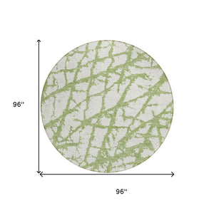 HomeRoots 5' Modern Green and Ivory Abstract Washable Area Rug for Indoor and Outdoor Style and Durability 8' Round 614343