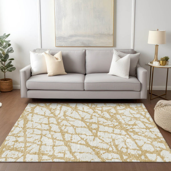 HomeRoots 5' Gold and Ivory Abstract Washable Area Rug - Durable, Stylish Design for Indoor and Outdoor Spaces 5' X 8' 614348