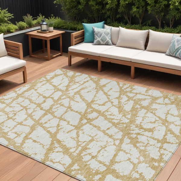 HomeRoots 5' Gold and Ivory Abstract Washable Area Rug - Durable, Stylish Design for Indoor and Outdoor Spaces 9' X 12' 614351