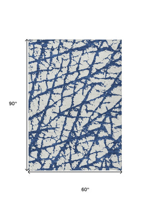 HomeRoots 5' Modern Navy Blue and Ivory Abstract Washable Area Rug for Indoor and Outdoor High-Traffic Spaces 5' X 8' 614372