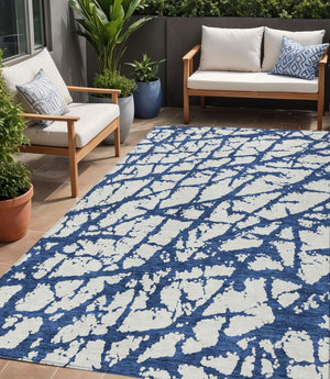 HomeRoots 5' Modern Navy Blue and Ivory Abstract Washable Area Rug for Indoor and Outdoor High-Traffic Spaces 5' X 8' 614372