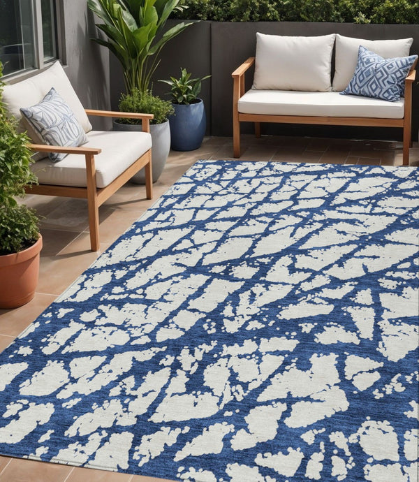 HomeRoots 5' Modern Navy Blue and Ivory Abstract Washable Area Rug for Indoor and Outdoor High-Traffic Spaces 5' X 8' 614372