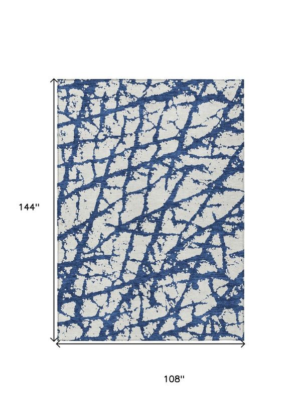 HomeRoots 5' Modern Navy Blue and Ivory Abstract Washable Area Rug for Indoor and Outdoor High-Traffic Spaces 9' X 12' 614375