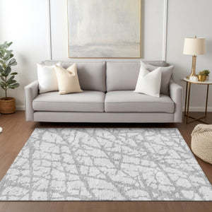 HomeRoots 5' Silver and Gray Abstract Area Rug - Stylish, Washable, Indoor/Outdoor, Stain-Resistant Design 10' X 14' 614388