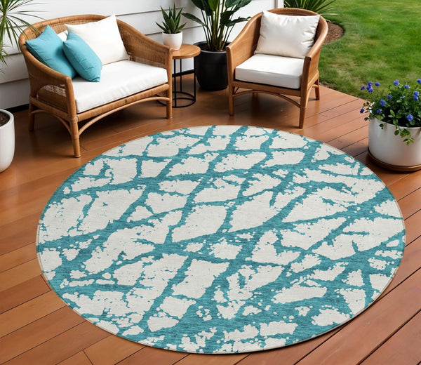 HomeRoots 5' Teal Blue and Ivory Abstract Area Rug - Durable, Washable, Perfect for Indoor and Outdoor Use 8' Round 614391