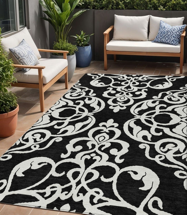 HomeRoots 5' Stylish Black and Ivory Damask Area Rug – Durable, Washable Design for Indoor and Outdoor Use 5' X 8' 614408