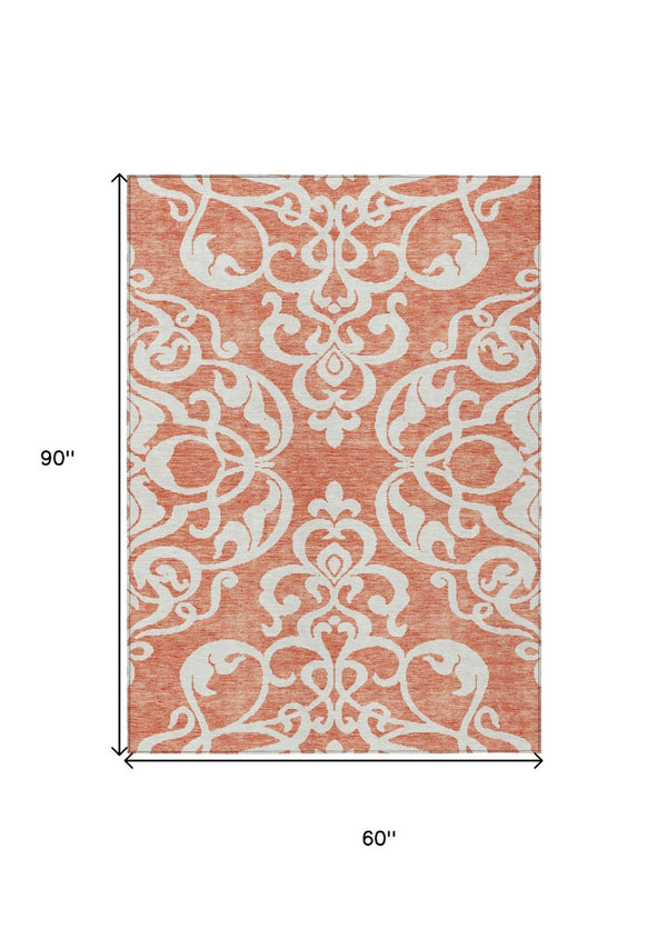 HomeRoots 5' Timeless Coral and Ivory Damask Area Rug – Washable, Durable Elegance for Indoor and Outdoor Spaces 5' X 8' 614420