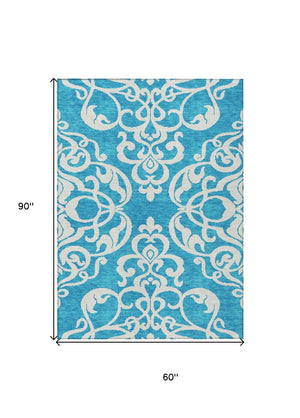 HomeRoots 5' Turquoise and Ivory Damask Rug - Stylish, Durable Washable Area Rug for Indoor and Outdoor Use 5' X 8' 614468