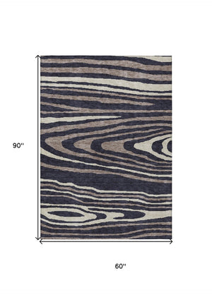 HomeRoots 5' Faux Bois Washable Area Rug in Black, Taupe & Beige - Durable Indoor/Outdoor Design for All Spaces 5' X 8' 614474