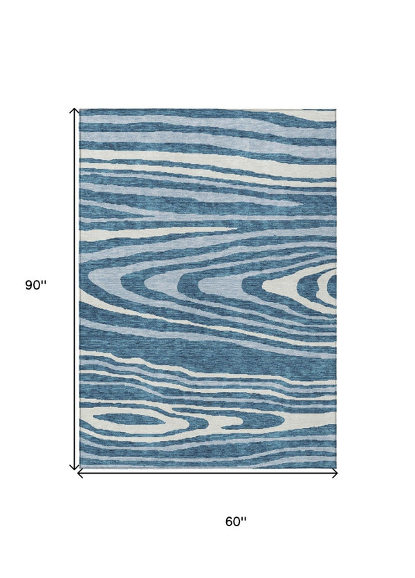 HomeRoots 5' Navy Blue Denim Faux Bois Area Rug – Stylish, Washable Indoor/Outdoor Design for Every Space 5' X 8' 614492