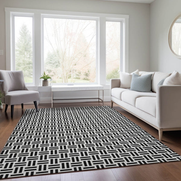 HomeRoots 5' Stylish Black and Ivory Geometric Area Rug - Durable, Washable, Perfect for Indoor & Outdoor Spaces 5' X 8' 614720