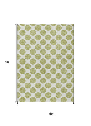 HomeRoots 5' Sage and Ivory Polka Dot Area Rug - Durable, Washable, Perfect for Indoor and Outdoor Spaces 5' X 8' 614864