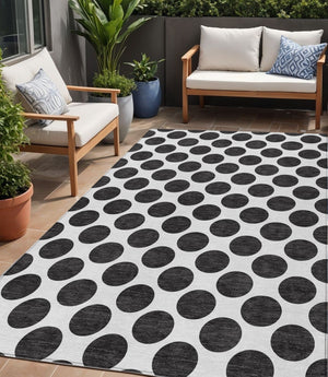 HomeRoots 5' Black and Ivory Polka Dot Washable Area Rug - Durable Design for Indoor and Outdoor Spaces 5' X 8' 614870