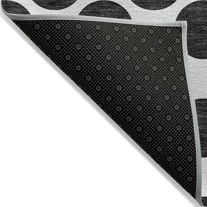 HomeRoots 5' Black and Ivory Polka Dot Washable Area Rug - Durable Design for Indoor and Outdoor Spaces 5' X 8' 614870