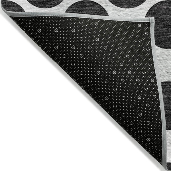 HomeRoots 5' Black and Ivory Polka Dot Washable Area Rug - Durable Design for Indoor and Outdoor Spaces 5' X 8' 614870