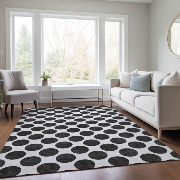 HomeRoots 5' Black and Ivory Polka Dot Washable Area Rug - Durable Design for Indoor and Outdoor Spaces 8' X 10' 614872