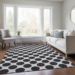 HomeRoots 5' Black and Ivory Polka Dot Washable Area Rug - Durable Design for Indoor and Outdoor Spaces 9' X 12' 614873