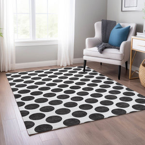 HomeRoots 5' Black and Ivory Polka Dot Washable Area Rug - Durable Design for Indoor and Outdoor Spaces 10' X 14' 614874