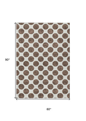 HomeRoots 5' Durable Brown and Ivory Polka Dot Area Rug – Washable, Stylish for Indoor and Outdoor Spaces 5' X 8' 614882