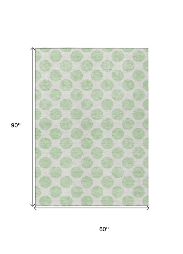 HomeRoots 5' Playful Mint Green and Ivory Polka Dot Area Rug – Durable, Washable Décor for Indoor and Outdoor Spaces 5' X 8' 614918