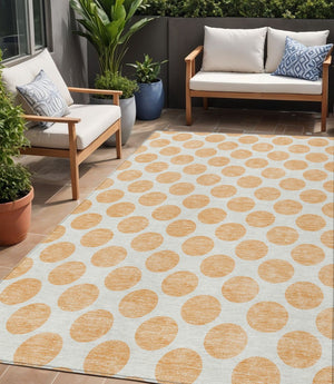 HomeRoots 5' Peach and Ivory Polka Dot Washable Area Rug for Indoor & Outdoor High-Traffic Spaces 5' X 8' 614930