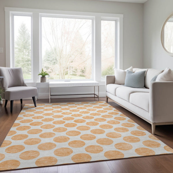 HomeRoots 5' Peach and Ivory Polka Dot Washable Area Rug for Indoor & Outdoor High-Traffic Spaces 5' X 8' 614930