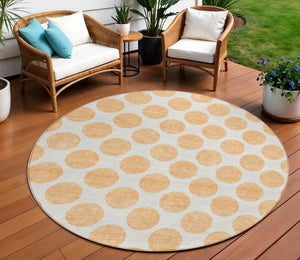 HomeRoots 5' Peach and Ivory Polka Dot Washable Area Rug for Indoor & Outdoor High-Traffic Spaces 8' Round 614931