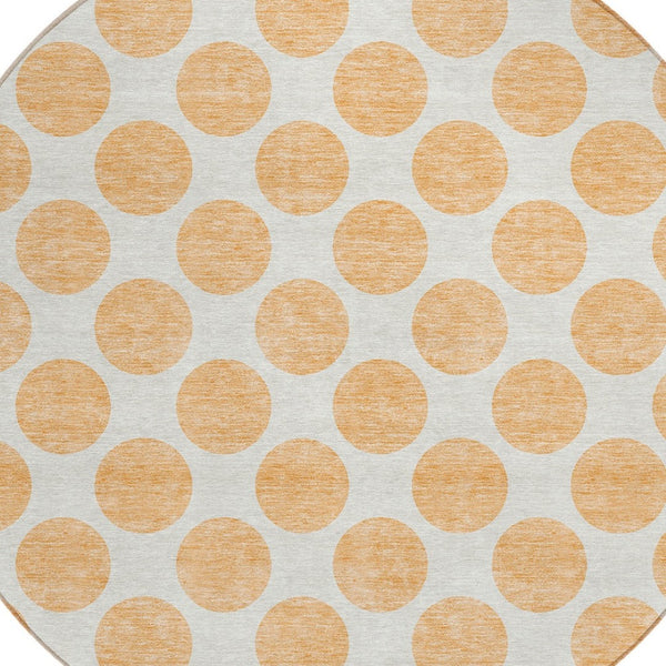 HomeRoots 5' Peach and Ivory Polka Dot Washable Area Rug for Indoor & Outdoor High-Traffic Spaces 8' Round 614931