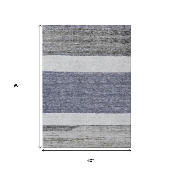 HomeRoots 5' Stylish Denim Blue Abstract Rug – Washable Indoor/Outdoor Solution for Modern Spaces & Durability 5' X 8' 615261