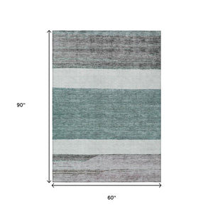 HomeRoots 5' Stylish Teal Blue and Gray Abstract Area Rug - Washable, Durable, Indoor/Outdoor Versatile Design 5' X 8' 615297