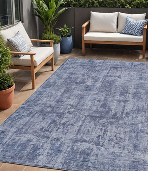HomeRoots 5' Blue and Ivory Abstract Area Rug - Stylish, Washable Design for Indoor and Outdoor Spaces 5' X 8' 615441